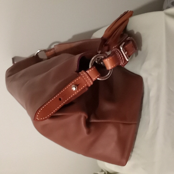 Dooney & Bourke Smooth Genuine Leather    Handbag. Color is a  Rich Caramel. - Picture 4 of 16
